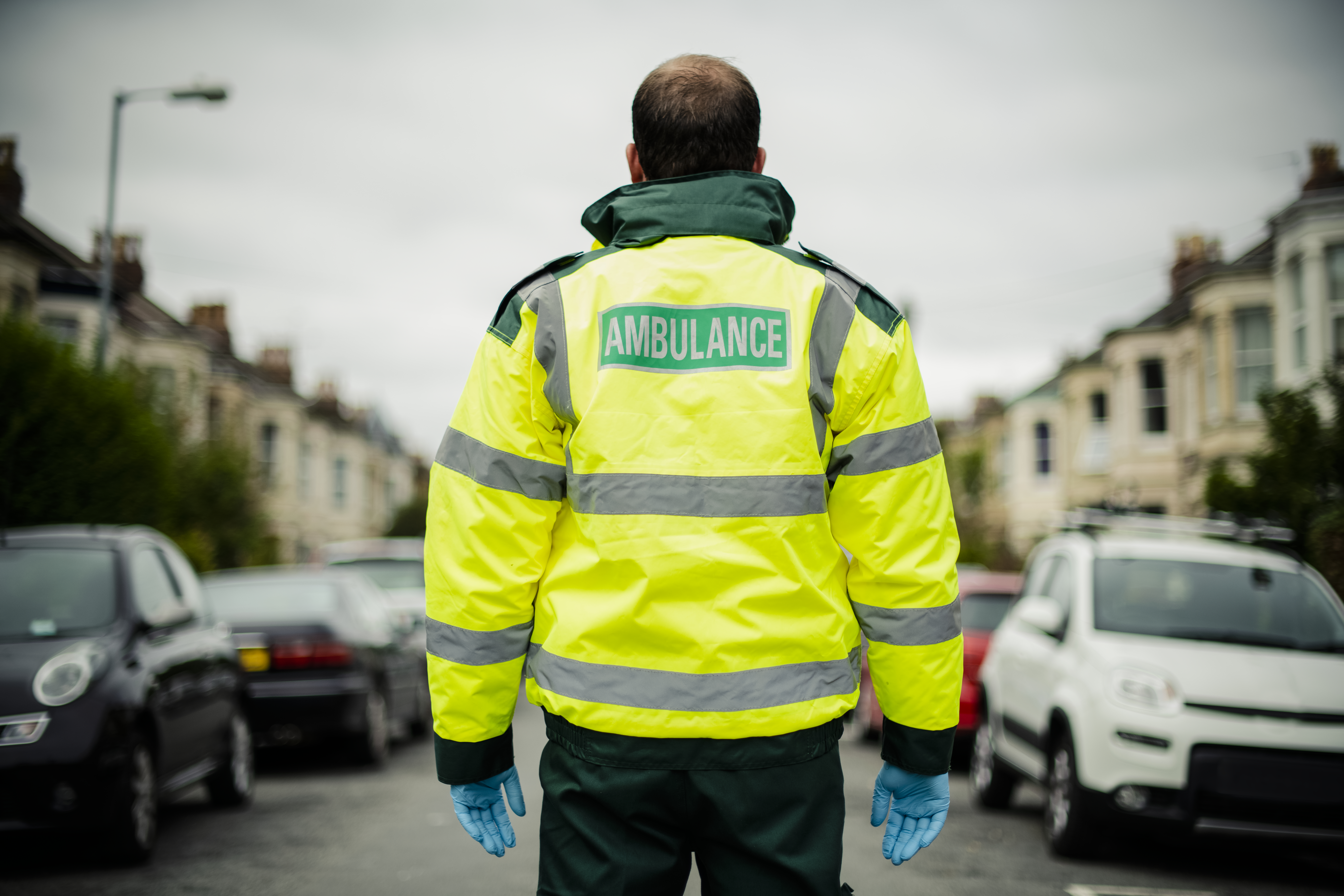 Paramedic in uniform and reflective vest, active career path for those on their feet.